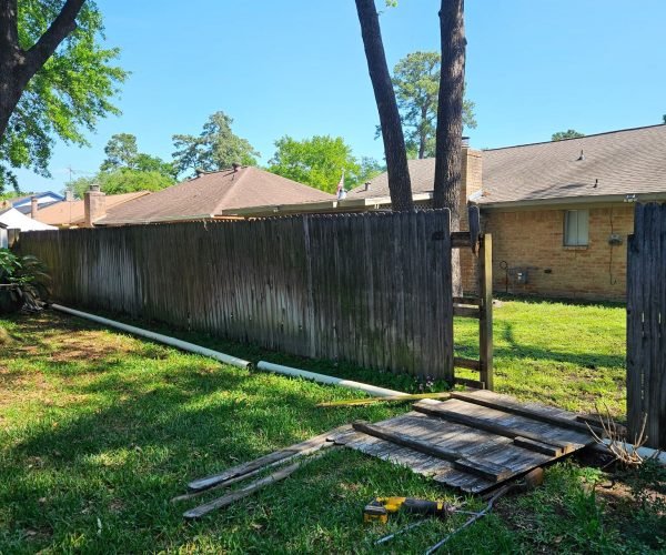 fence repair service replacement broken or leaning sections